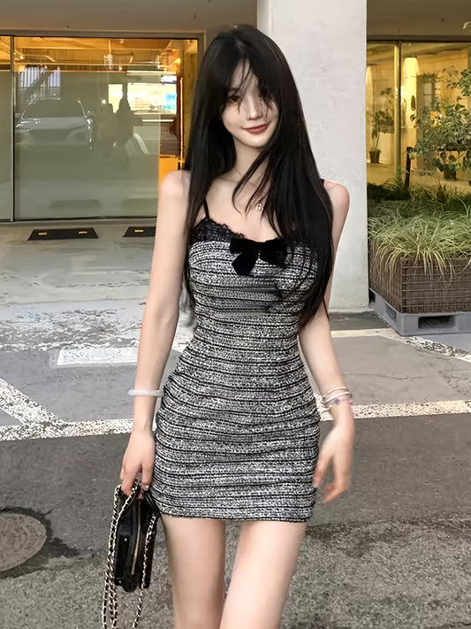 This bow strappy dress features a summer hot with a cinched waist and a stylish design. It's a short skirt with a French chanty style